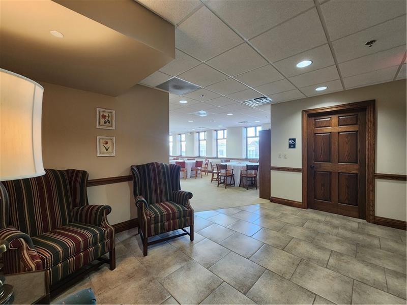 19 East Washington Street New Castle, PA 16101 - Photo 8 of 16 a lobby with furniture and a couch