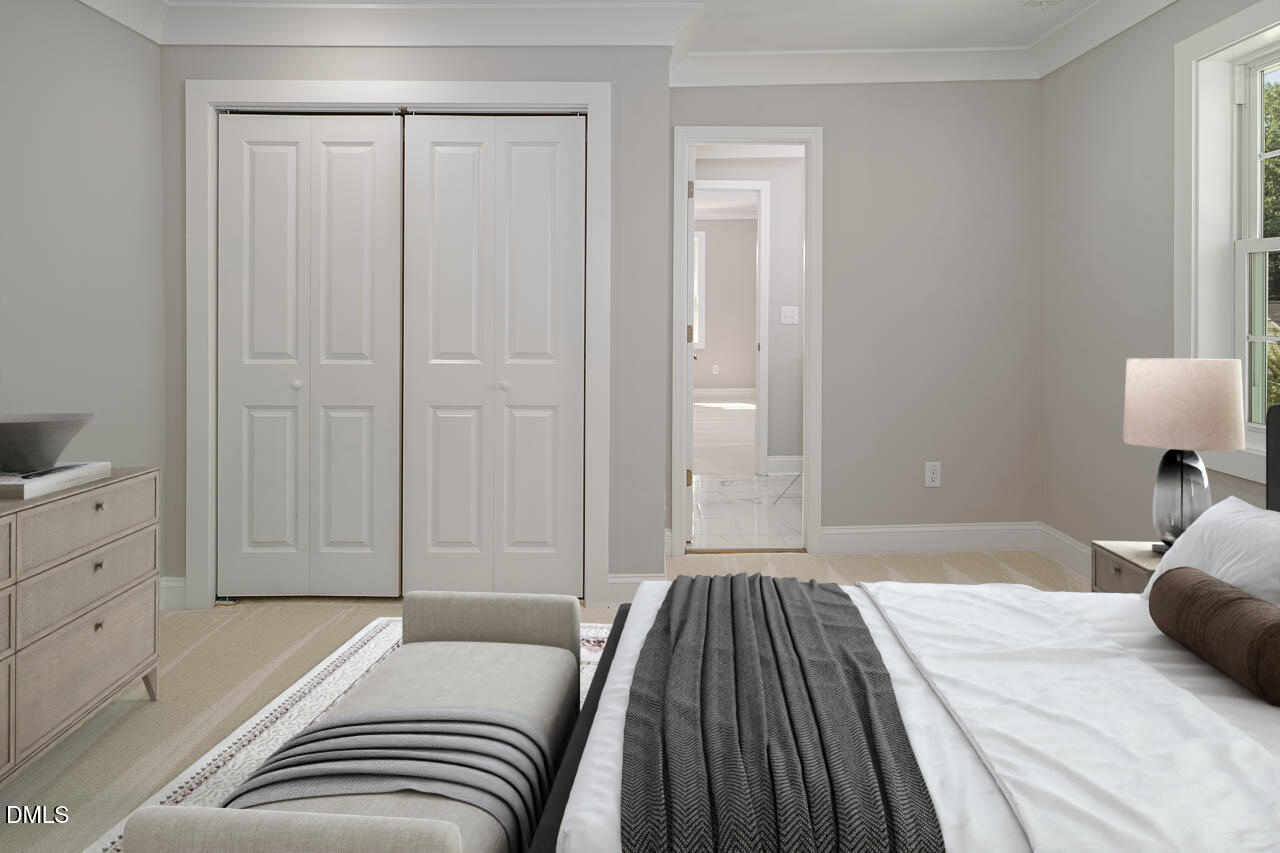 101 South Maple Street Durham, NC 27703 - Photo 13 of 27 a bedroom with a bed and a cabinets