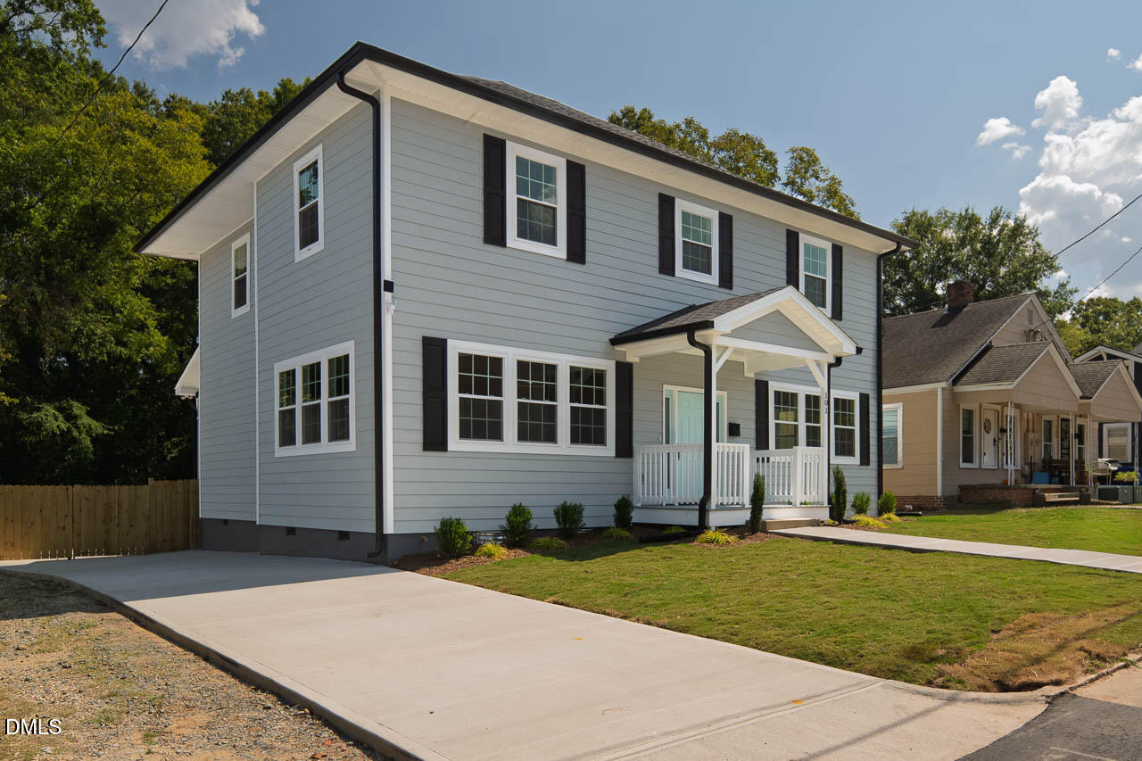 101 South Maple Street Durham, NC 27703 - Photo 16 of 27 a front view of a house with a yard