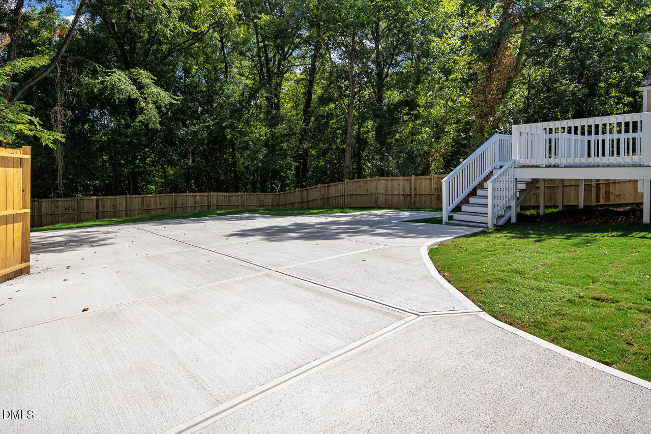 101 South Maple Street Durham, NC 27703 - Photo 20 of 27 a view of a house with pool and a yard