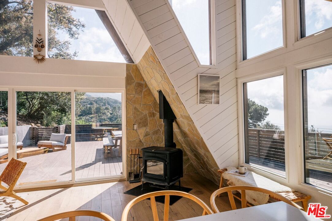 4828 Glenn Road Santa Barbara, CA 93105 - Photo 4 of 31 a view of a balcony with couch and city view
