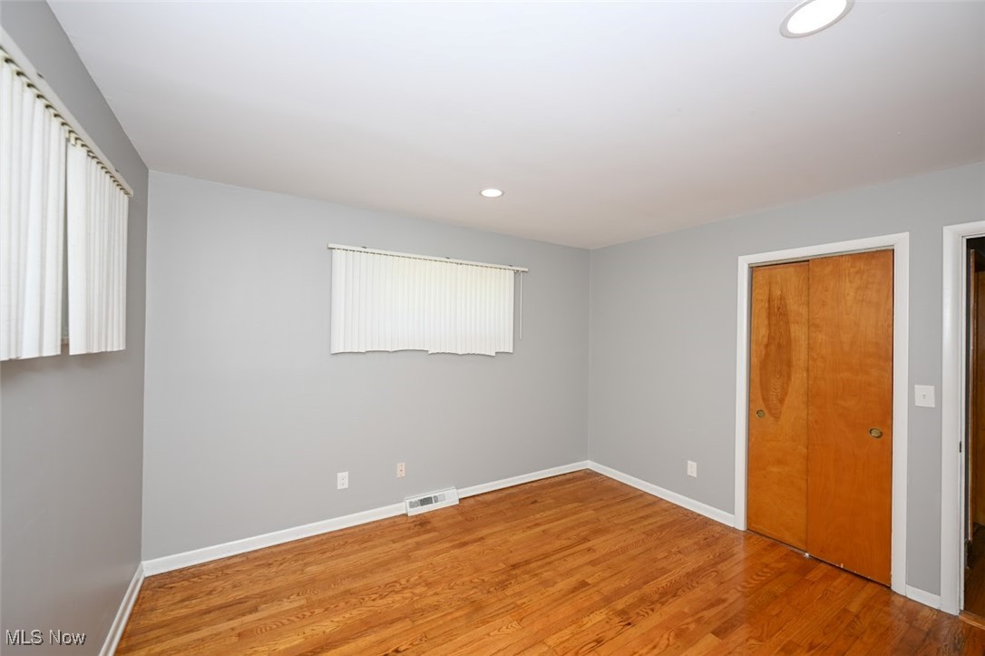 13150 Sprague Road Cleveland, OH 44130 - Photo 20 of 39 Unfurnished bedroom featuring wood finished floors and recessed lighting