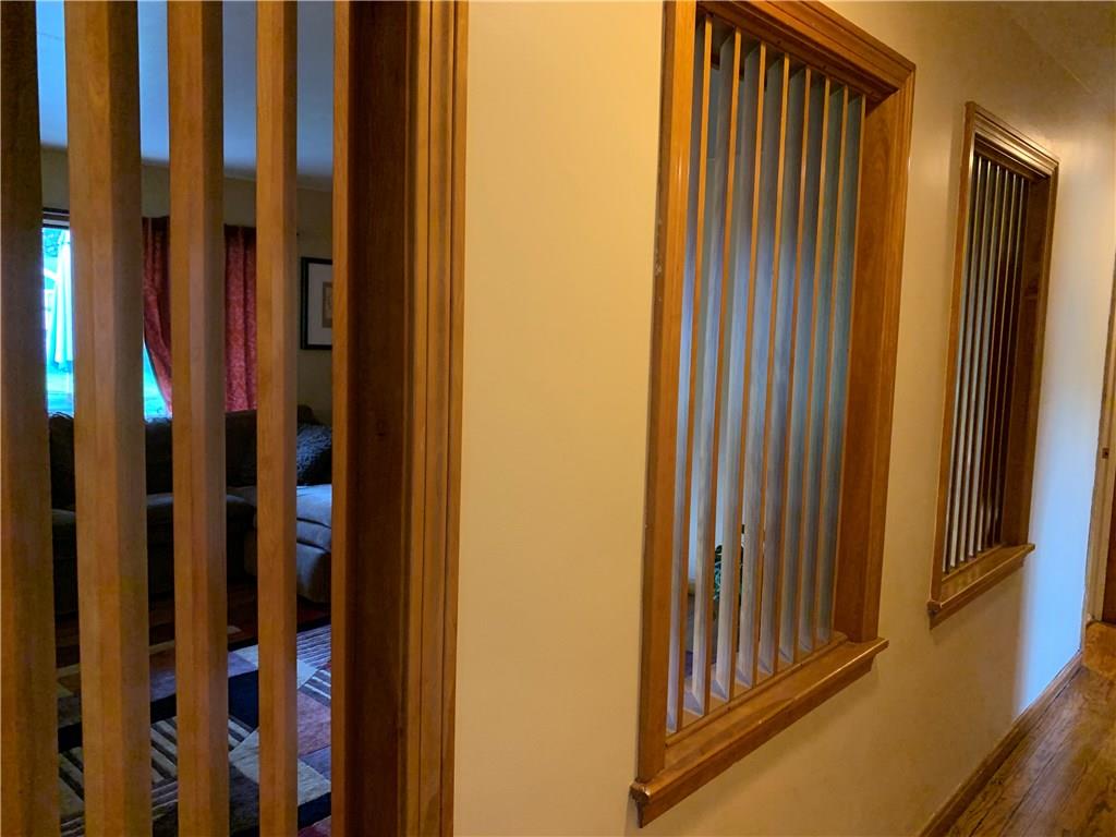1362 Highland Road Sharon, PA 16146 - Photo 12 of 24 Unique, slatted frames, dividing living room and hallway.