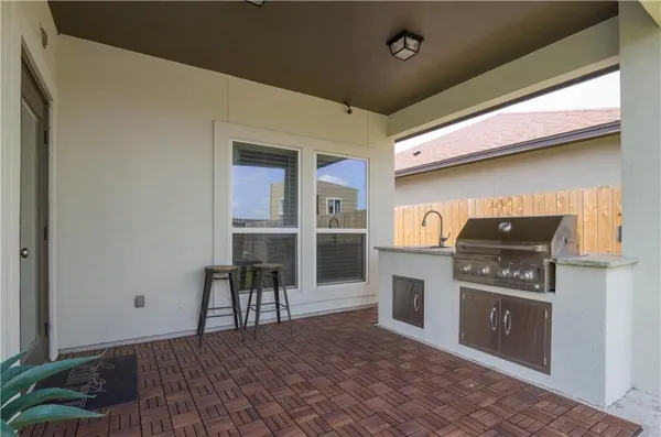 a house view with a garden space