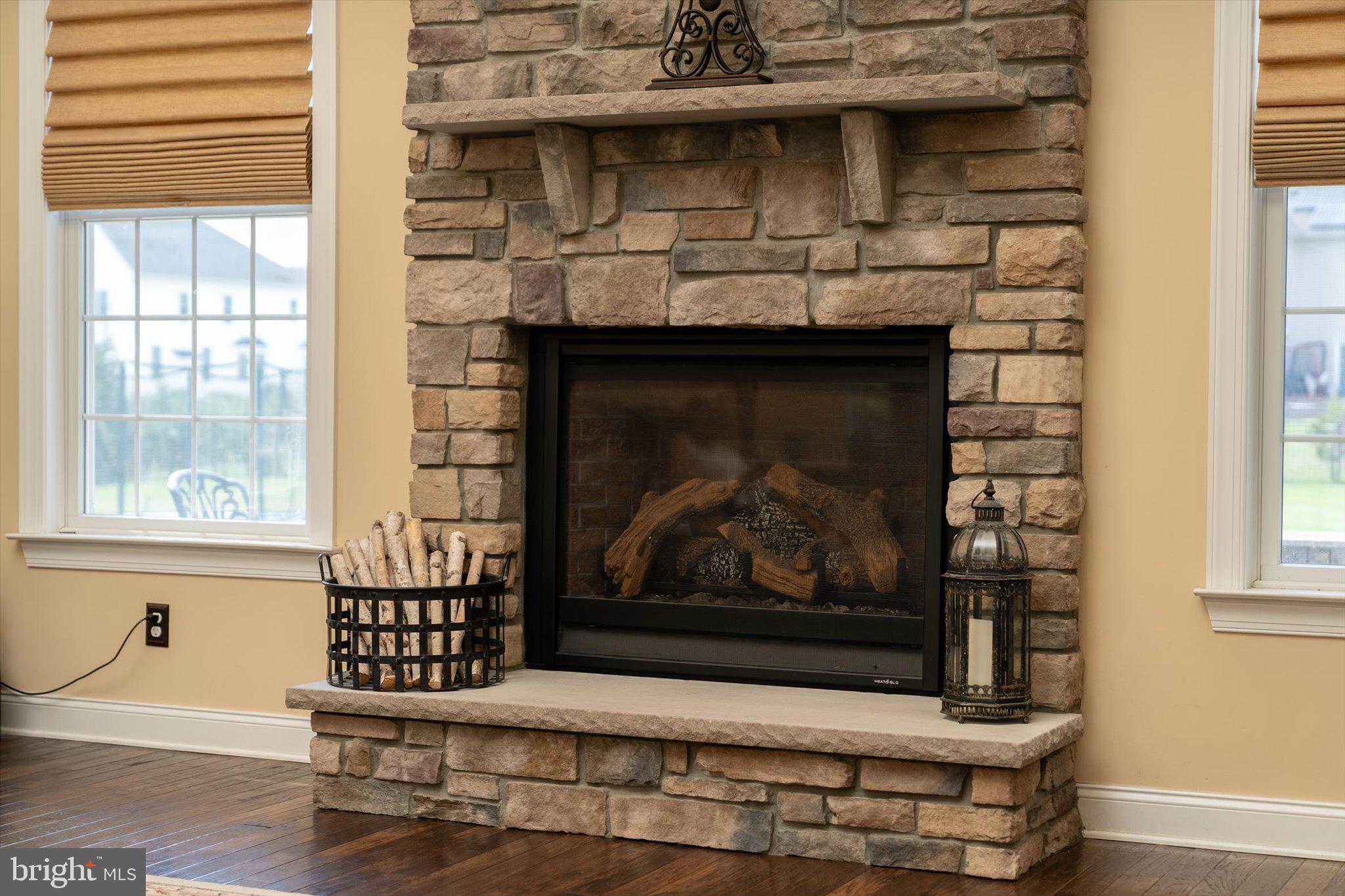25 Weathervane Circle Cream Ridge, NJ 08514 - Photo 21 of 91 a front view of a fireplace with wooden floor