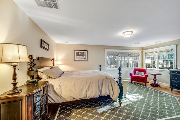 44 Myopia Road Winchester, MA 01890 - Photo 15 of 30 a bedroom with a bed and wooden floor