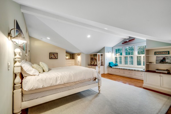44 Myopia Road Winchester, MA 01890 - Photo 19 of 30 a spacious bedroom with a large bed and a large window