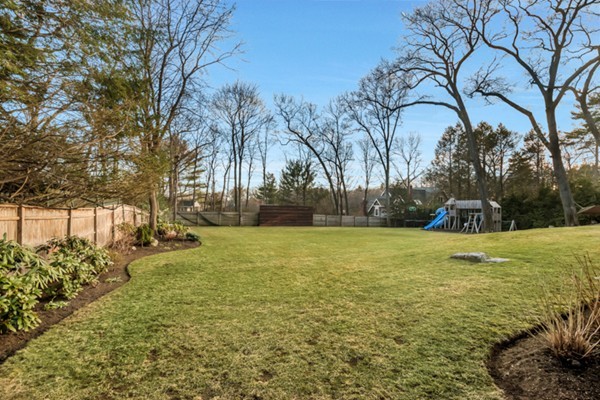 44 Myopia Road Winchester, MA 01890 - Photo 23 of 30 a view of a yard with a tree