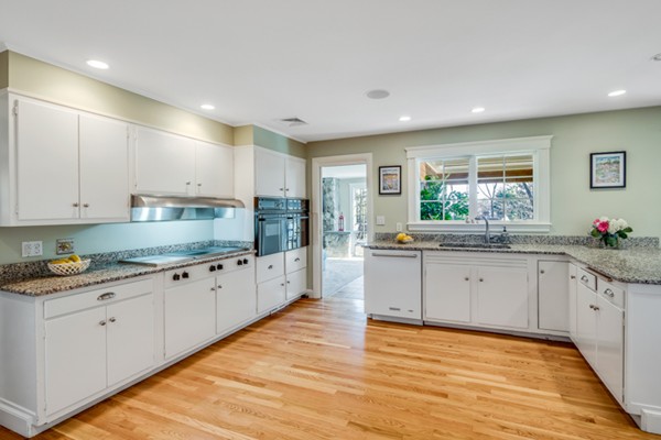 44 Myopia Road Winchester, MA 01890 - Photo 7 of 30 a large kitchen with granite countertop a sink and cabinets