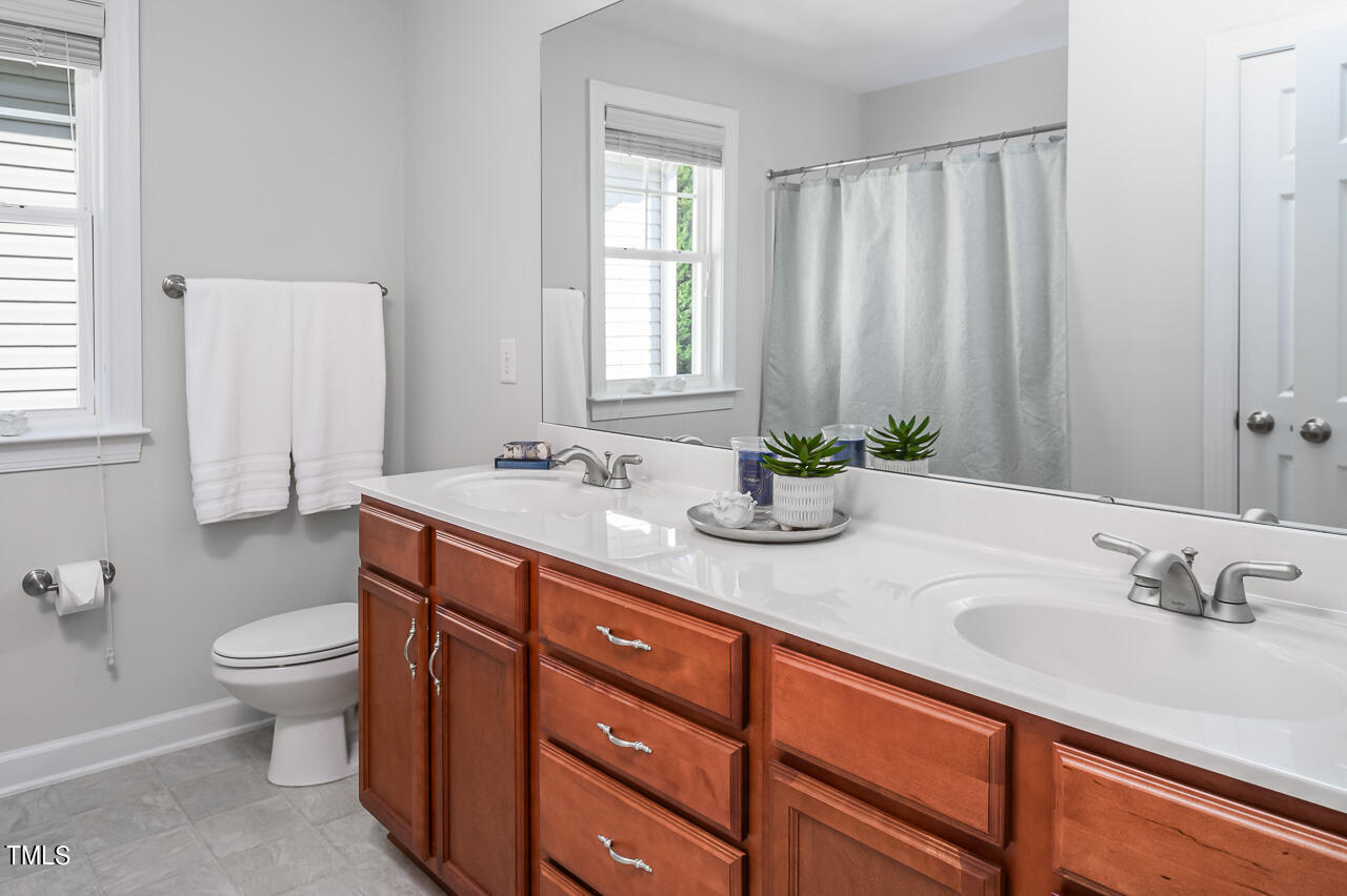 3837 Cumberland Pond Road Raleigh, NC 27606 - Photo 20 of 37 owner's suite 2nd level bathroom