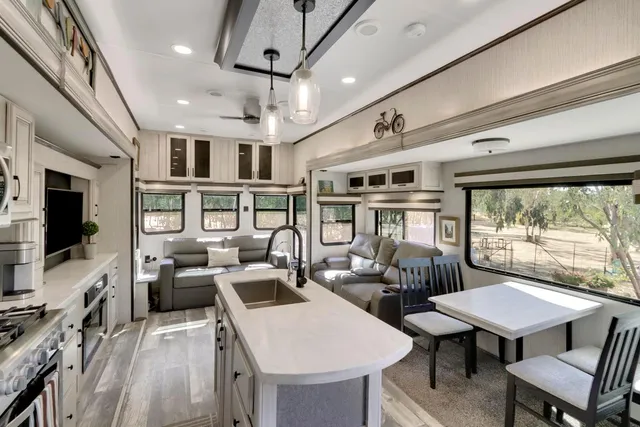 a living room with furniture and flat screen tv