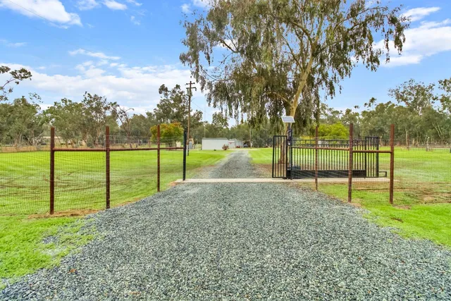 a view of a park with swings and slides