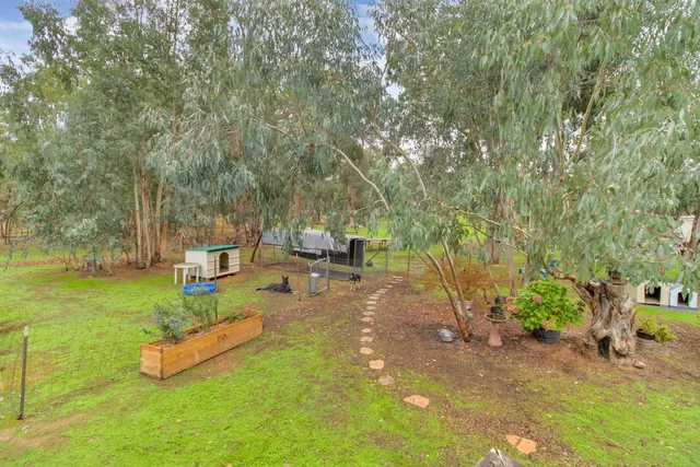 a view of washer and dryer with kitchen in the background