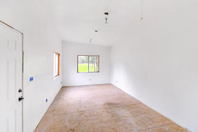 a view of a golf course with a lake