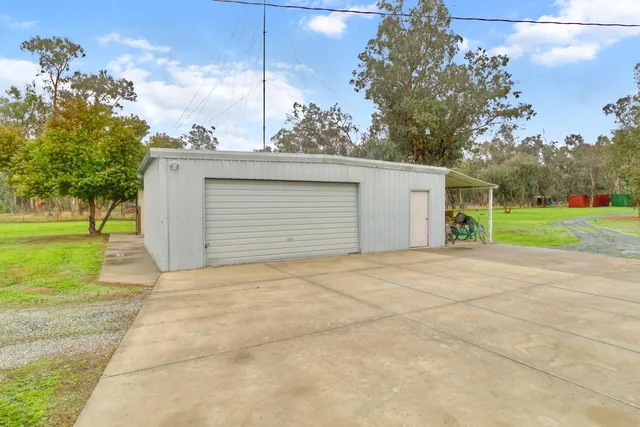 a house view with a backyard space