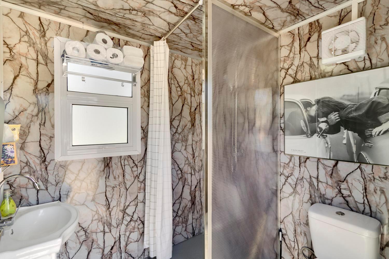 13435 Bennett Road Herald, CA 95638 - Photo 46 of 80 a bathroom with a toilet and a shower curtain