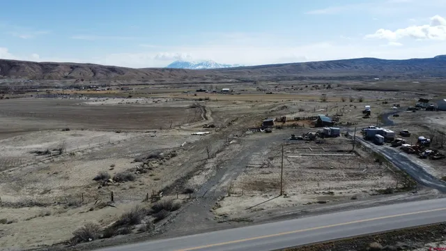 a view of a road with an ocean view