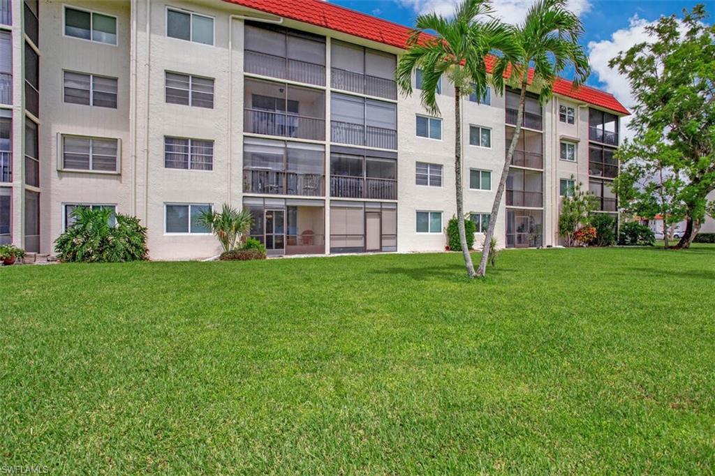 4380 27th Court Southwest, Unit 1 Naples, FL 34116 - Photo 24 of 34 View of apartment building / complex
