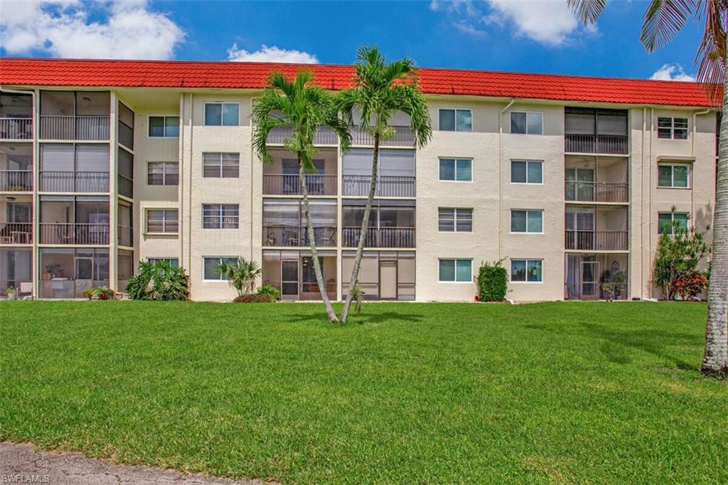 4380 27th Court Southwest, Unit 1 Naples, FL 34116 - Photo 25 of 34 View of apartment building / complex