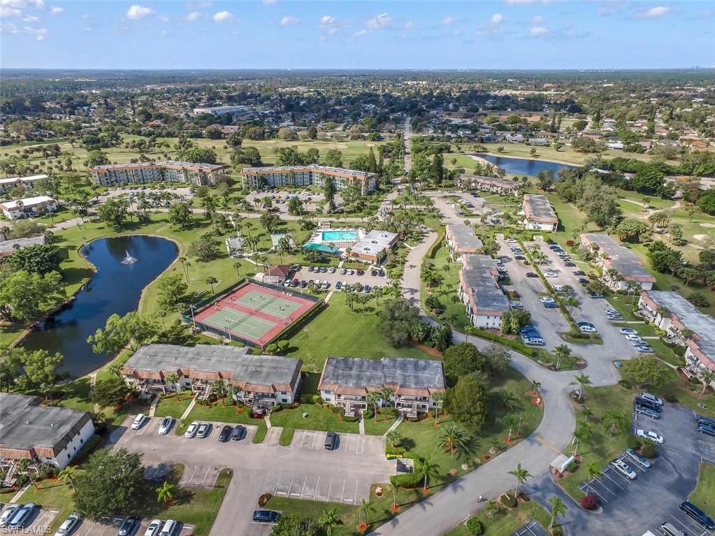 4380 27th Court Southwest, Unit 1 Naples, FL 34116 - Photo 34 of 34 Unit is in first 4 story building at the top of this photo All building on located on a private circular road close to everything Naples has to offer.