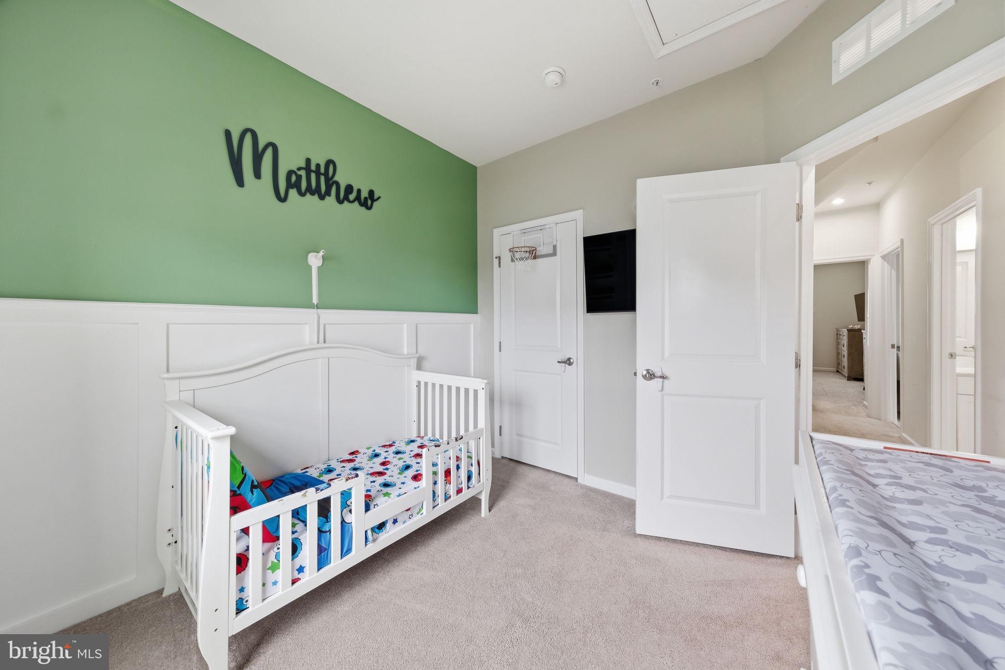 3012 Bretons Ridge Way Hanover, MD 21076 - Photo 24 of 37 a bedroom with furniture with a baby crib