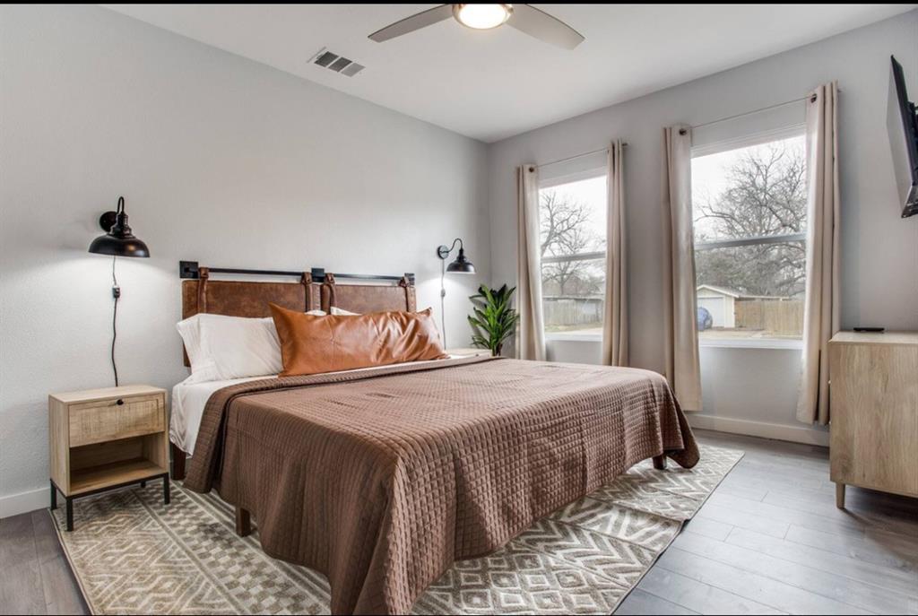 1606 West 12th Street Dallas, TX 75208 - Photo 9 of 20 Bedroom with wood finished floors and ceiling fan