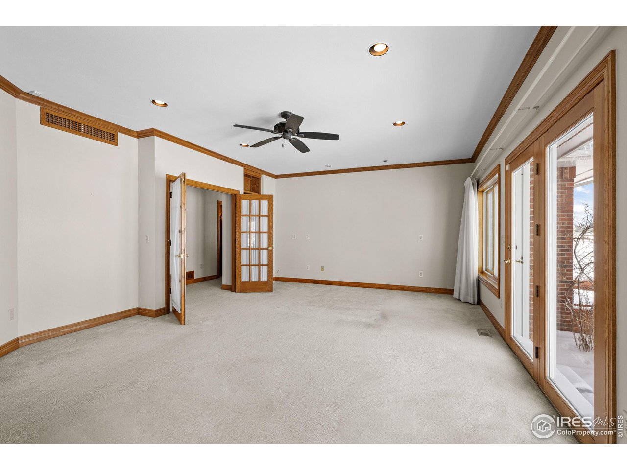 9967 Phillips Road Lafayette, CO 80026 - Photo 19 of 35 a view of a livingroom with a staircase