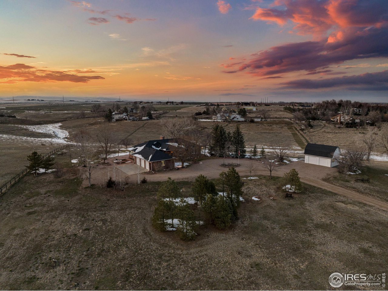 9967 Phillips Road Lafayette, CO 80026 - Photo 28 of 35 a view of a parking space with lots of trees in the background