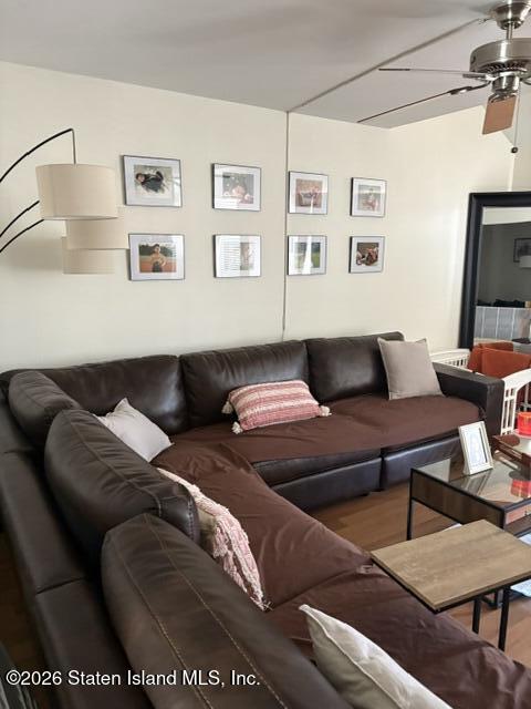 243 Pond Way, Unit B Staten Island, NY 10303 - Photo 4 of 10 a living room with furniture
