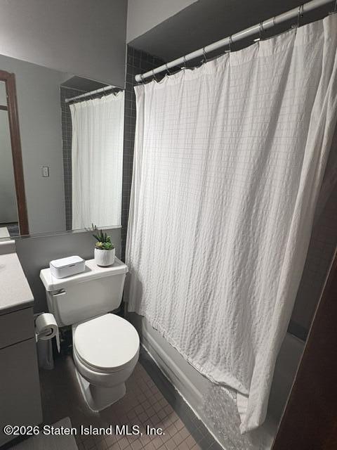243 Pond Way, Unit B Staten Island, NY 10303 - Photo 9 of 10 a bathroom with a toilet a sink and a shower