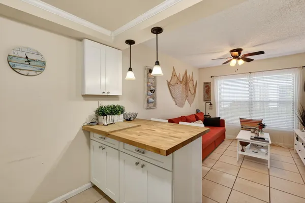 a room that has a table and chairs in it