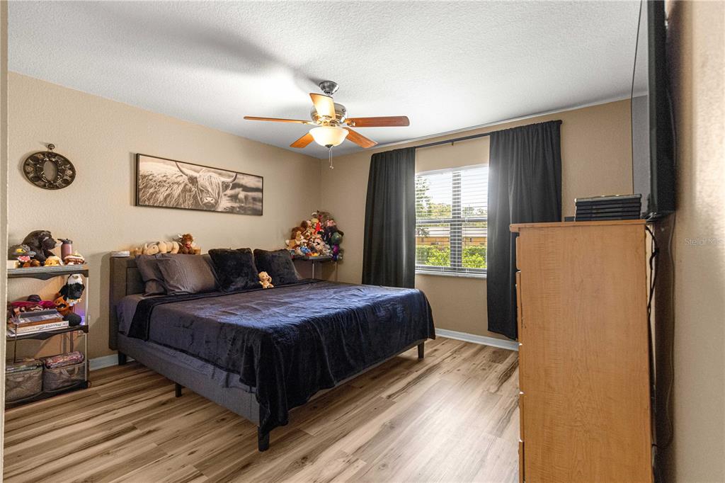 2837 Northeast 3rd Street, Unit 203 Ocala, FL 34470 - Photo 18 of 41 a bedroom with bed and window