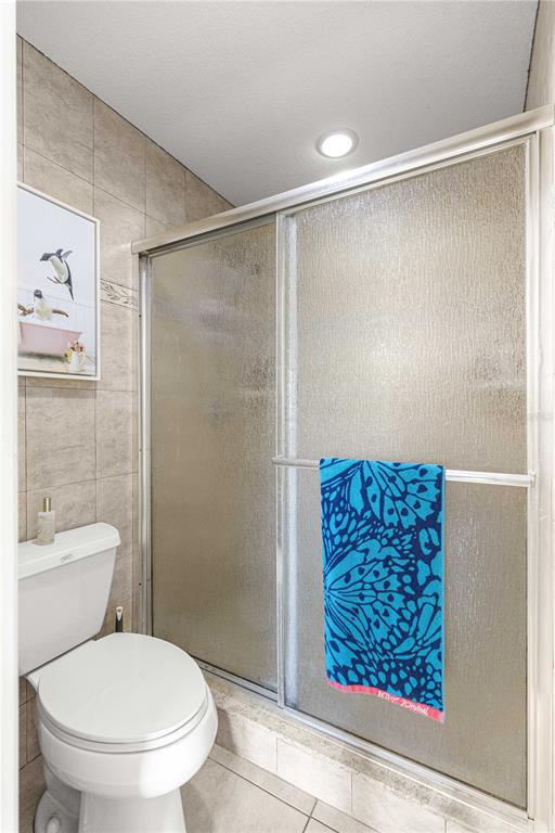 2837 Northeast 3rd Street, Unit 203 Ocala, FL 34470 - Photo 29 of 41 a bathroom with a shower and a toilet