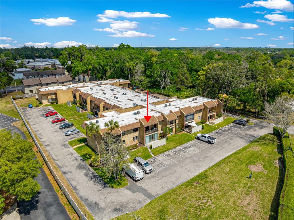 2837 Northeast 3rd Street, Unit 203 Ocala, FL 34470 - Photo 35 of 41 a view of a terrace with chairs
