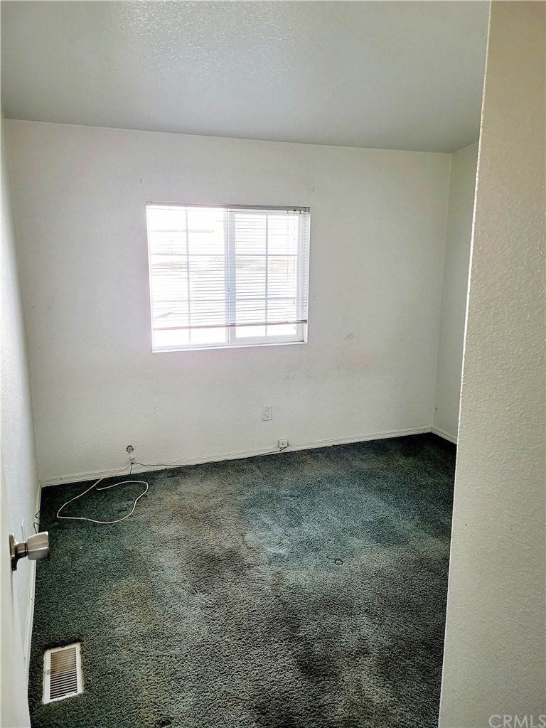32 Walnut Via Anaheim, CA 92801 - Photo 4 of 24 an empty room with a window