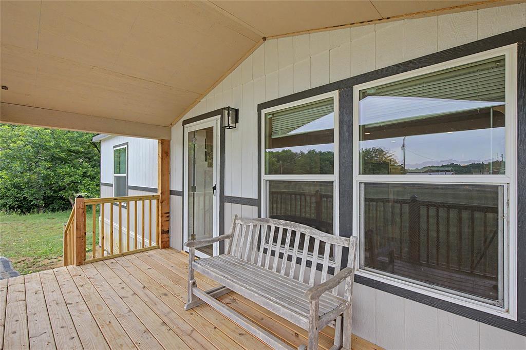 6065 Timber Trail Azle, TX 76020 - Photo 3 of 33 a view of a two chairs on the deck