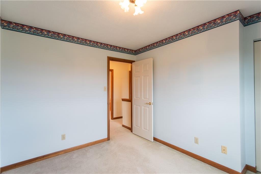 128 Moffett Run Road Aliquippa, PA 15001 - Photo 25 of 48 a very nice looking room with a ceiling fan