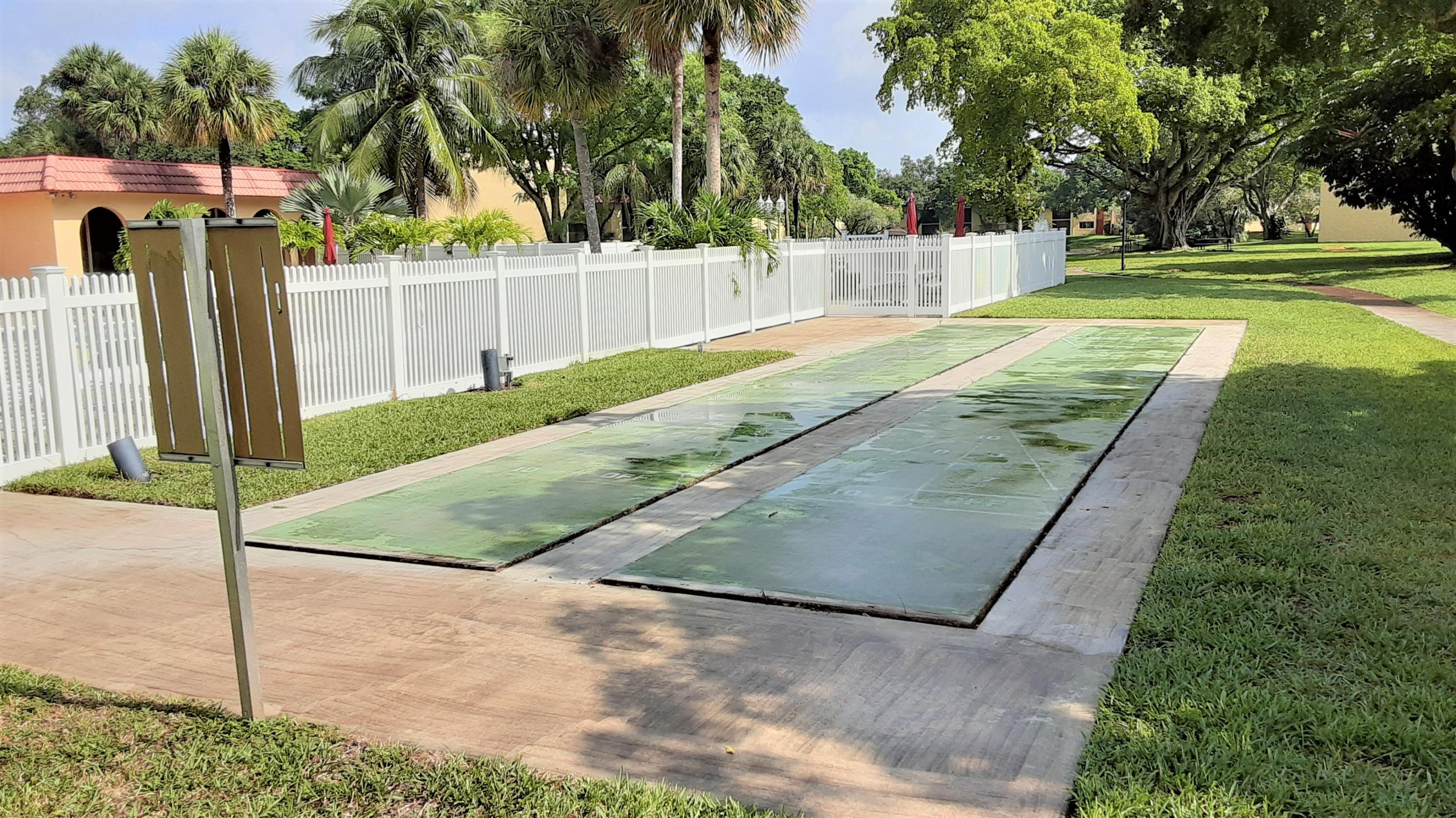 818 Southwest 9th St Circle, Unit 103 Boca Raton, FL 33486 - Photo 23 of 27 shuffle board