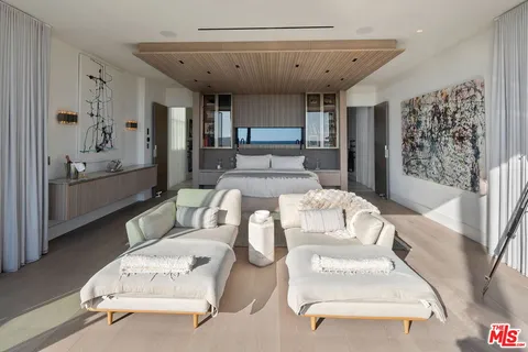 a bathroom with a sink double vanity and a mirror