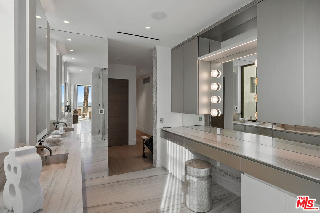 938-940 Palisades Beach Road Santa Monica, CA 90403 - Photo 34 of 72 a bathroom with a sink a toilet and shower