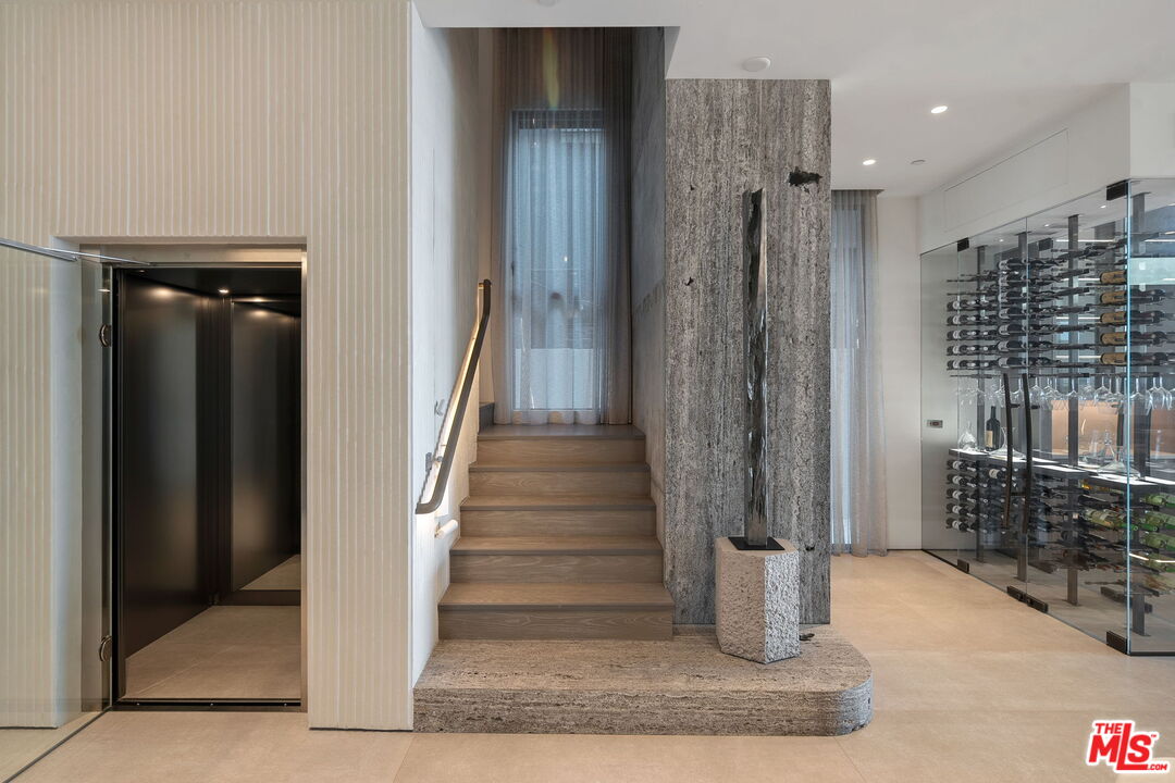 938-940 Palisades Beach Road Santa Monica, CA 90403 - Photo 6 of 72 a view of entryway with wooden floor and stairs