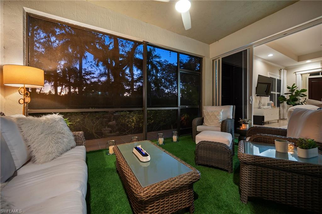 2306 Tradition Way, Unit 102 Naples, FL 34105 - Photo 12 of 39 Evening view of the lanai.