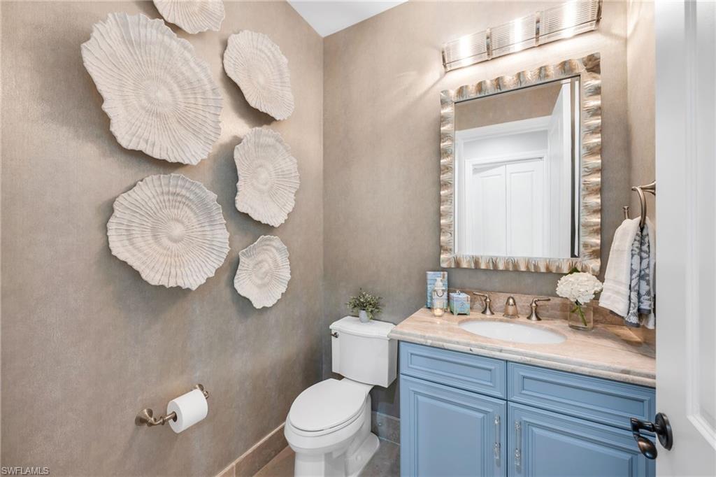 2306 Tradition Way, Unit 102 Naples, FL 34105 - Photo 19 of 39 Powder room located near the office.
