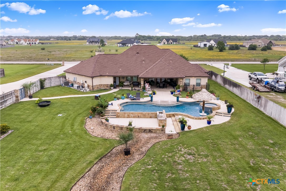 254 Sendera Loop Victoria, TX 77904 - Photo 15 of 48 an aerial view of a house with garden space and outdoor seating