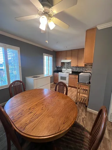 a view of a dining room with furniture