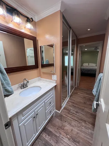 a bathroom with a sink and a mirror