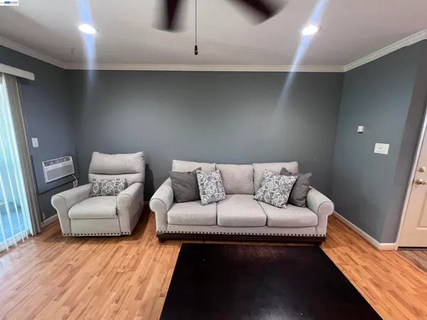 a living room with furniture and a couch