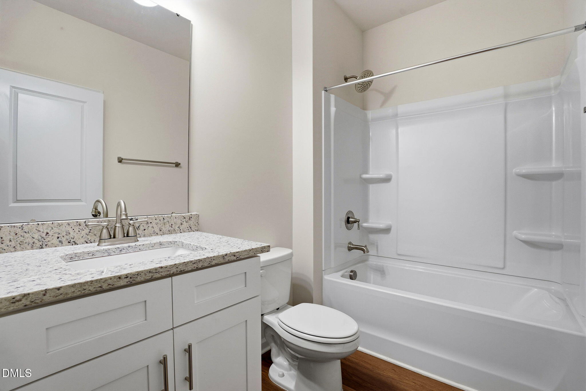 9019 Phoenix Court Spring Hope, NC 27882 - Photo 9 of 34 a bathroom with a granite countertop sink toilet and shower