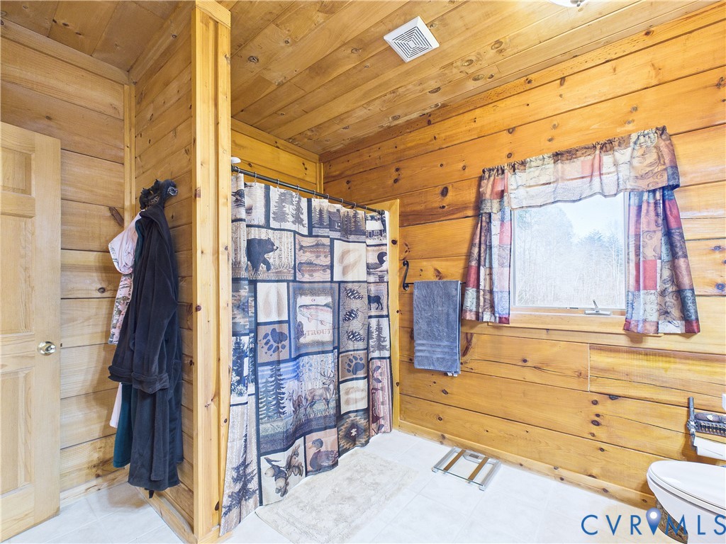 469 Jenkins Church Road Cumberland, VA 23040 - Photo 16 of 40 a view of walk in closet