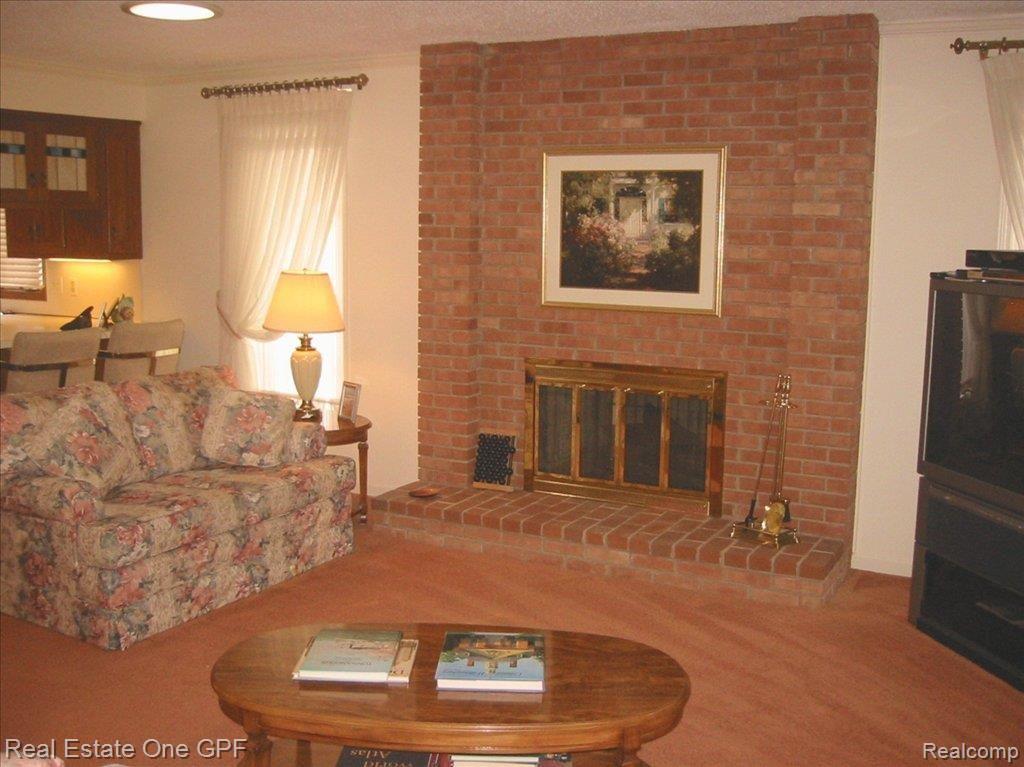 57 Vernier Road Grosse Pointe, MI 48236 - Photo 6 of 11 living room fireplace